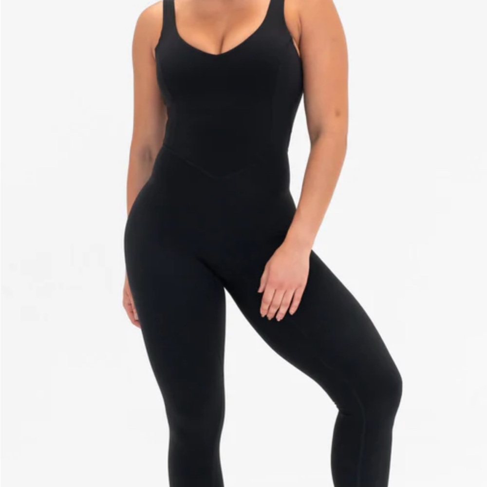 Black Sleeveless Jumpsuit with Scoop Neckline and Stretchy Fabric